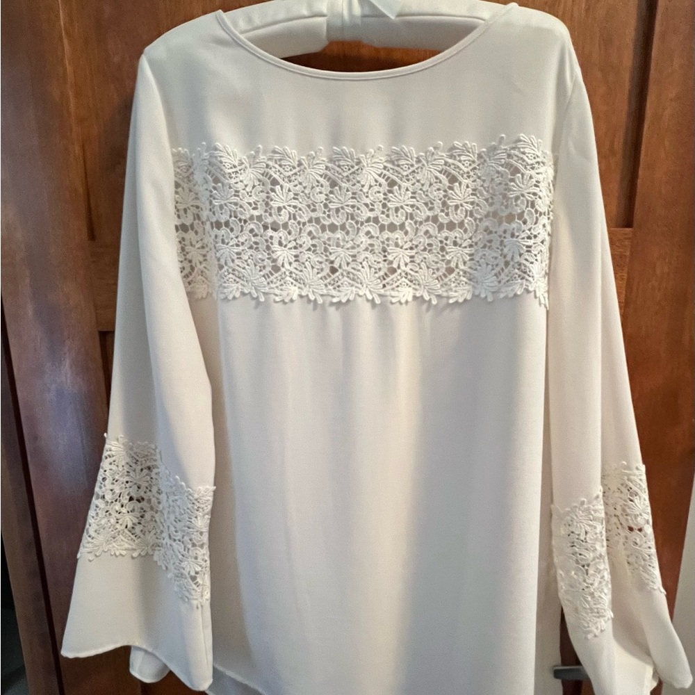 Size 2 Chicos off-white blouse with lace detail. Gently used, like new